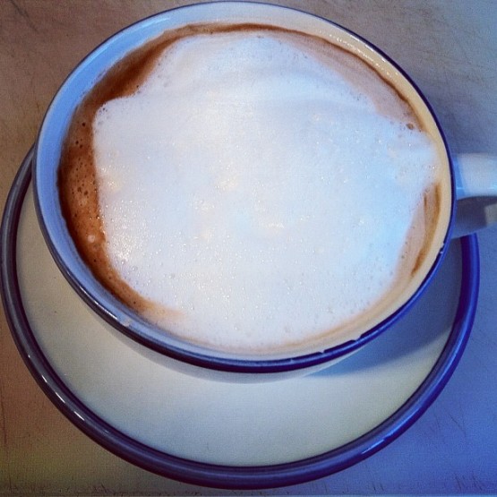 Espresso plus frothed milk in cup